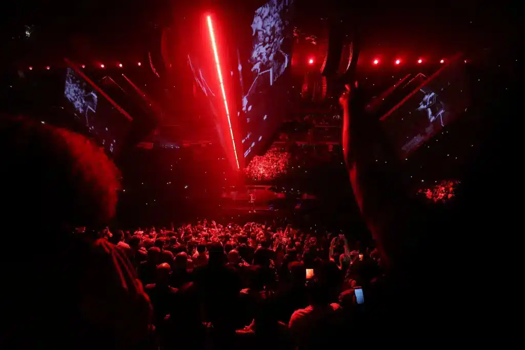 Chauffeur service in Charlotte NC – live concert crowd with stage lighting