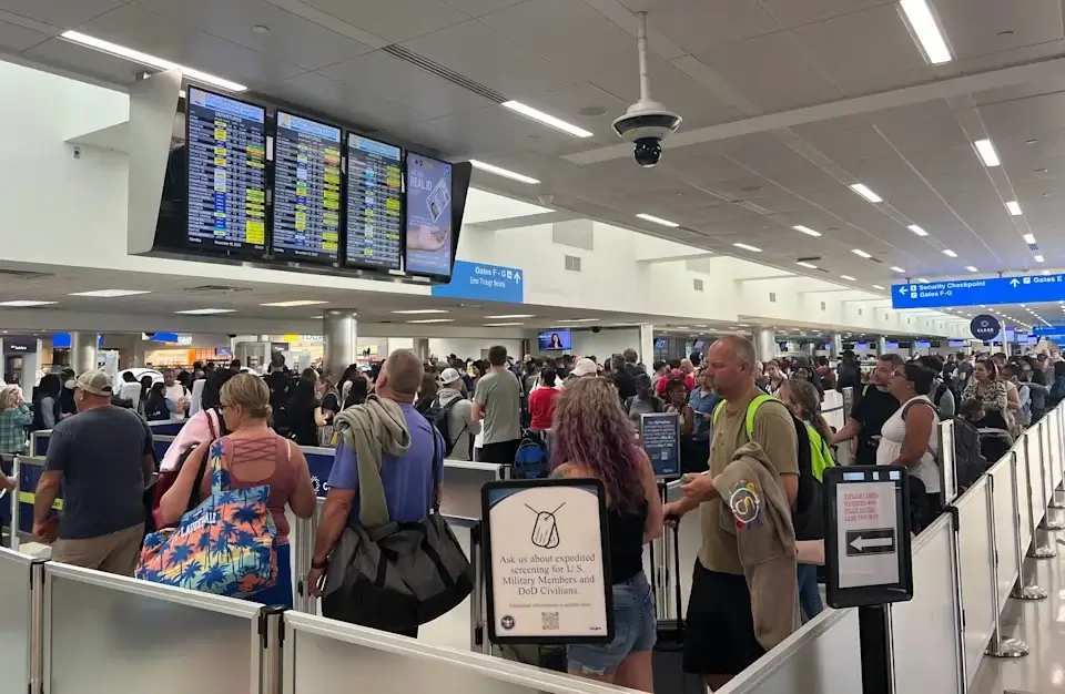 Crowded airport check-in and security area, reliable airport car service and executive transportation in Charlotte