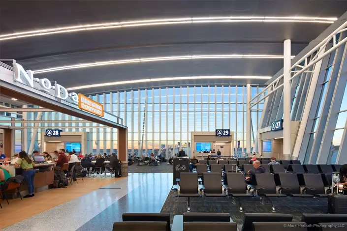 CLT airport terminal interior for travel navigation with VOY Black Car airport service