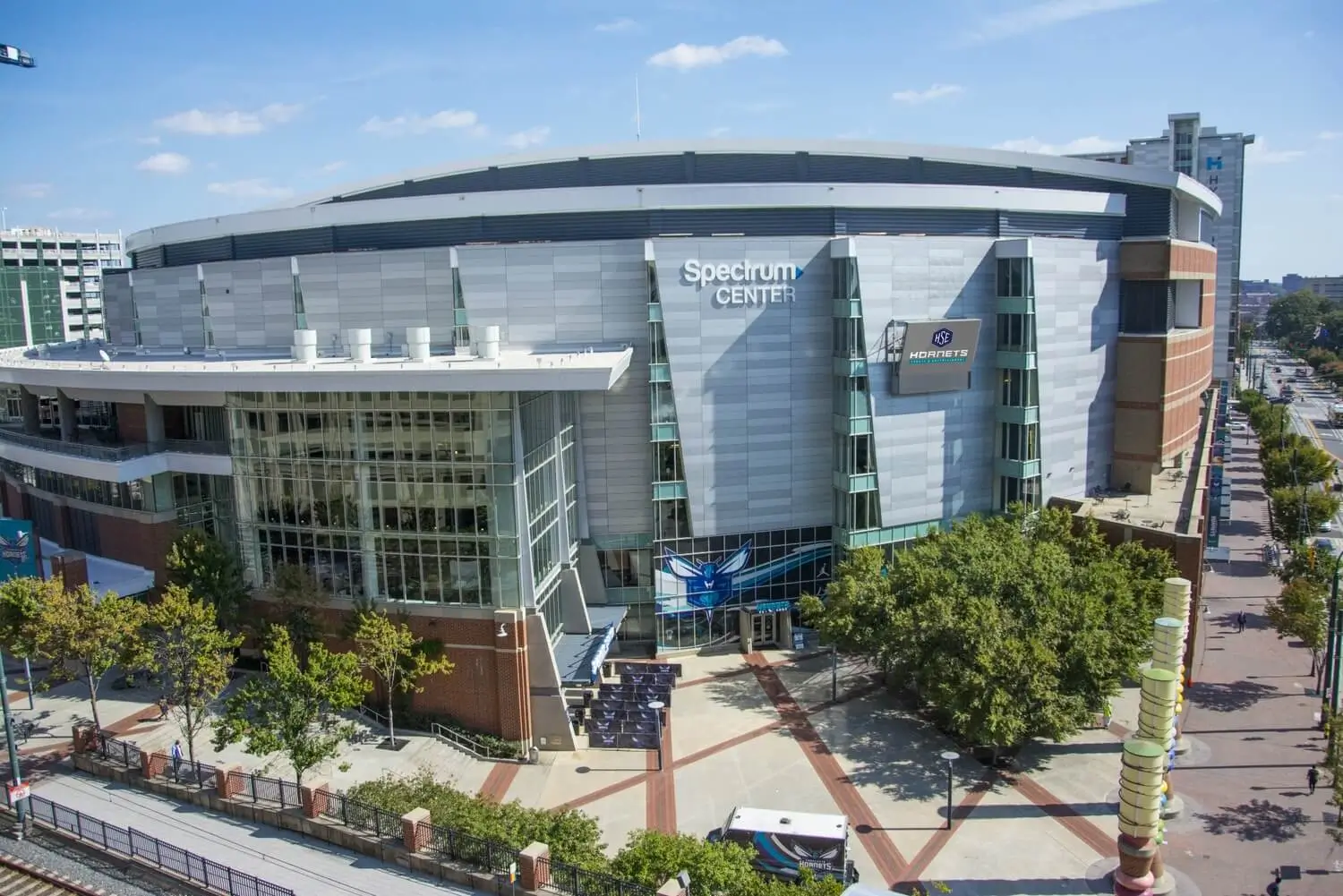 Modern exterior view of Spectrum Center in Uptown Charlotte, featured in a guide to the city’s largest entertainment venues