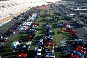 Classic cars at Charlotte Motor Speedway auto fair for event transportation with VOY Black Car service