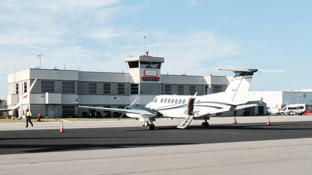 Private jet at Concord Regional Airport for executive travel with VOY Black Car chauffeur service